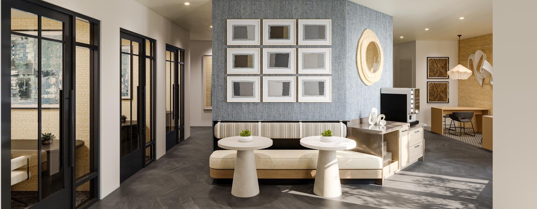 resident lounge with a large chandelier and a large white table